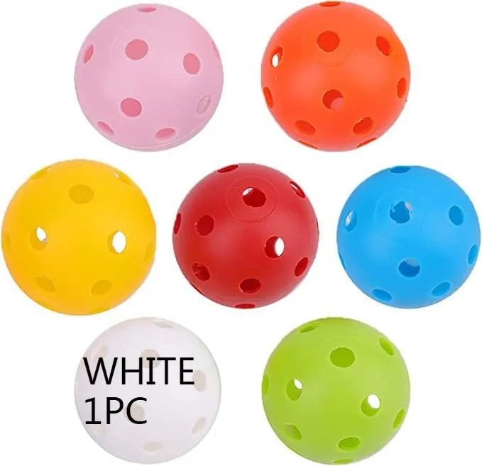 Six multi-colour 42mm golf practice balls in red, orange, blue, green, white, and yellow in a net.