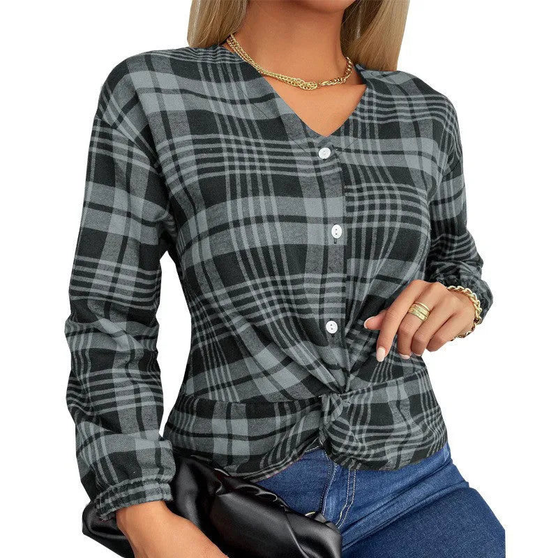Women's purple plaid polyester shirt with loose casual cut and regular sleeves on hanger