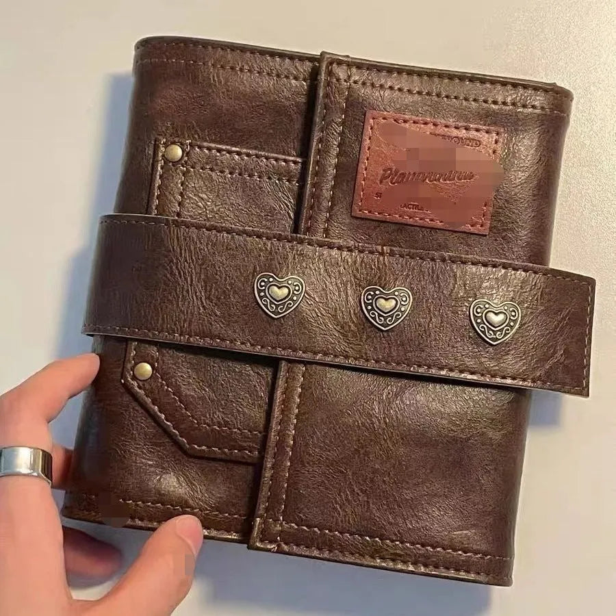 Brown retro leather buckle notebook with loose-leaf binder binding, A7 size with raw wood pulp paper