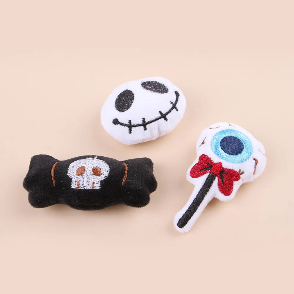 Handheld plush cat teaser toy with candy design on small wand for interactive play