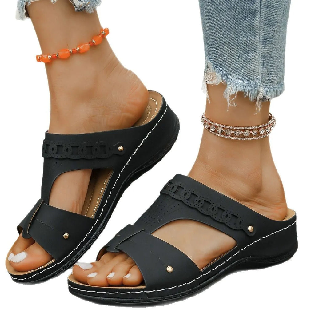 Women's Roman style slippers with slope heel and fish mouth toe design in PU upper and rubber sole