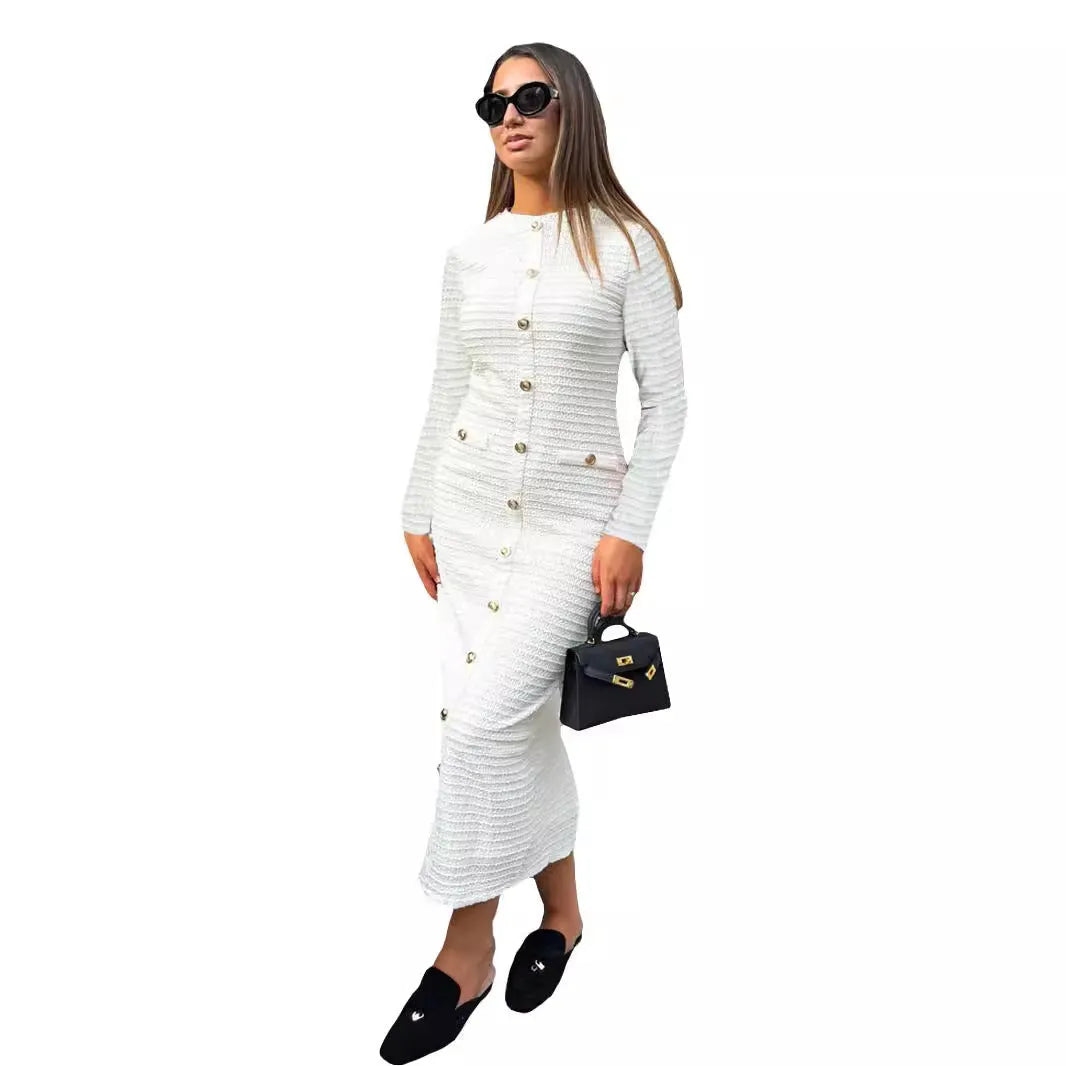 Black slim fit knitted dress with long sleeves, a French retro collar, and button detailing.