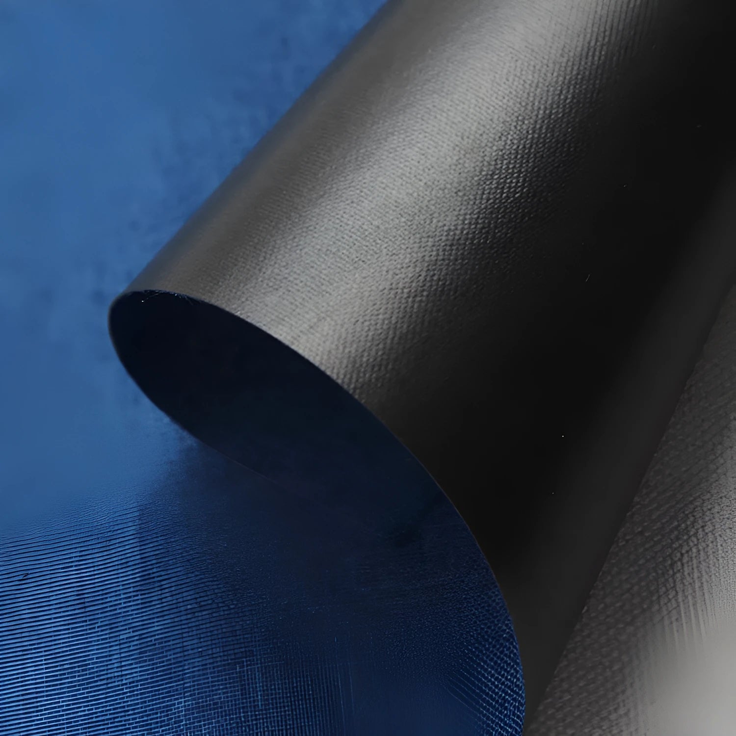 A piece of ant cloth fabric in either black, blue, or green, made from 100% polyester.