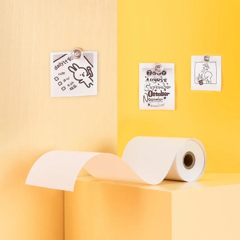 Three rolls of 57mm x 30mm thermal paper for small portable printers in packaging