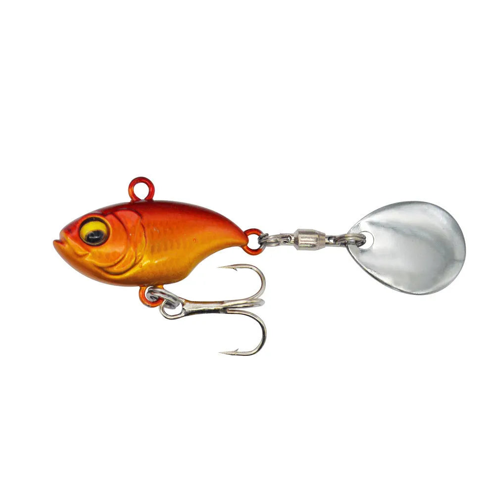 Metal sea fishing lure with rotating sequins in gold colour pattern