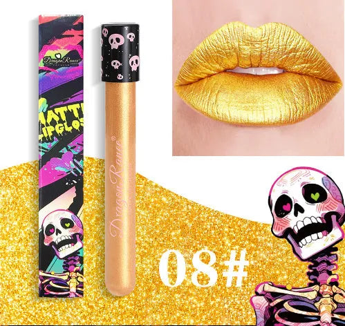 Halloween creative makeup lip gloss in skull-shaped test tube packaging, showing a matte gold and silver finish.
