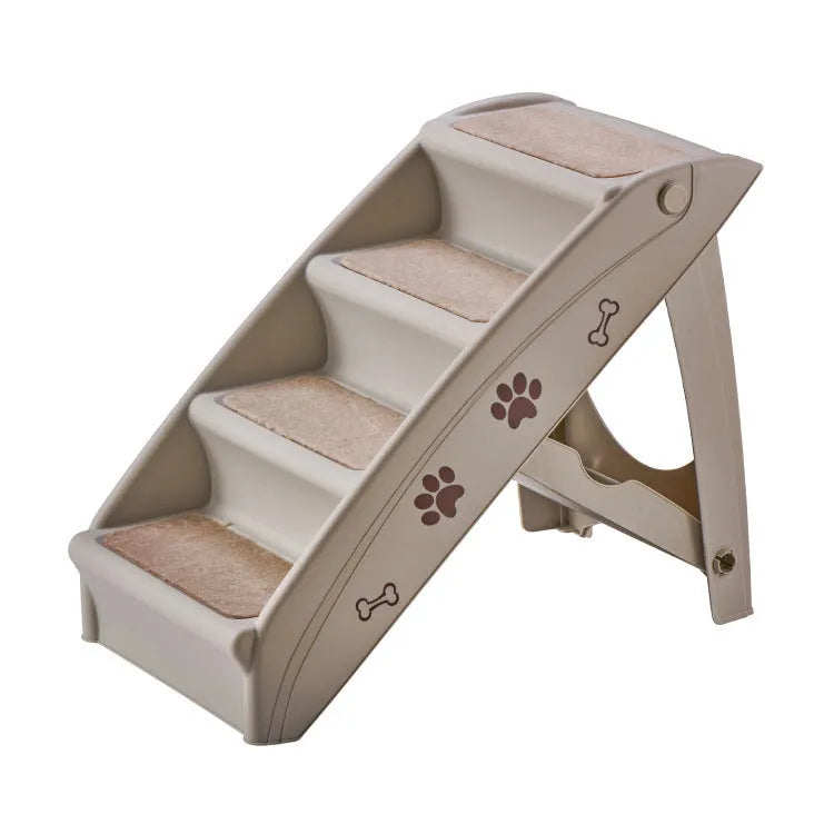 Foldable plastic pet stairs for small dogs on a carpet next to a sofa.