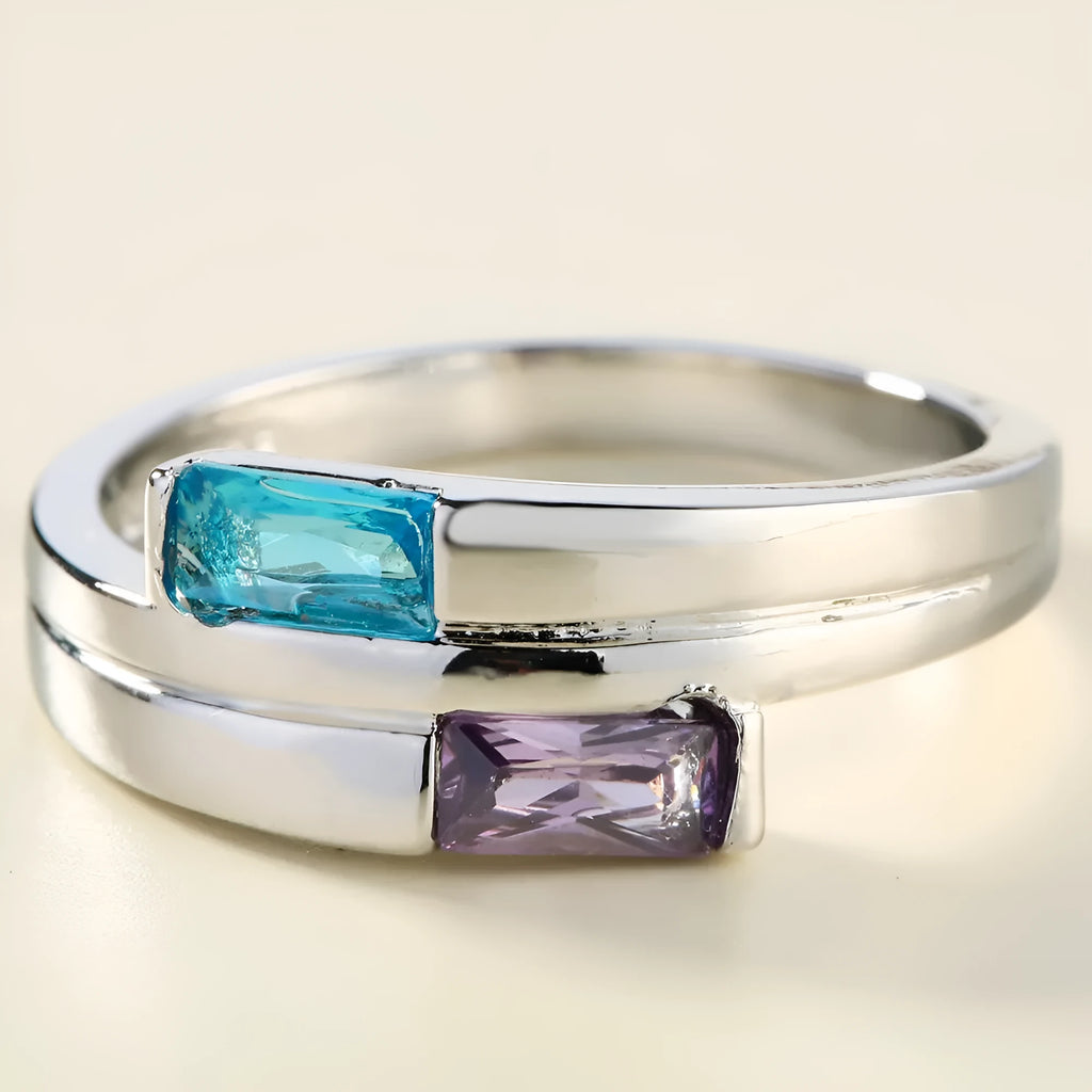 Copper ring with zircon stone inlay in electroplated silver finish showing European styling
