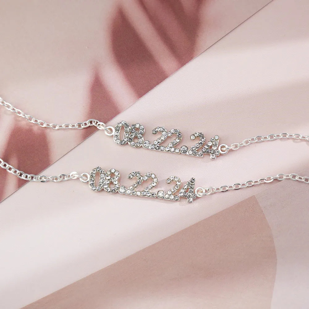 Stainless steel digital bracelet with diamond studs around LED display, shown in gold colour