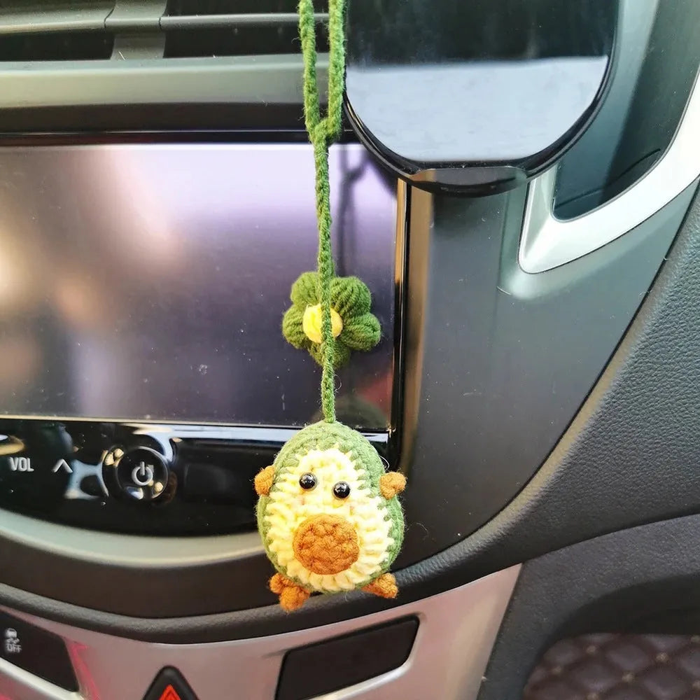 Handmade crocheted car pendant in avocado, pink rainbow, and red rainbow colour designs