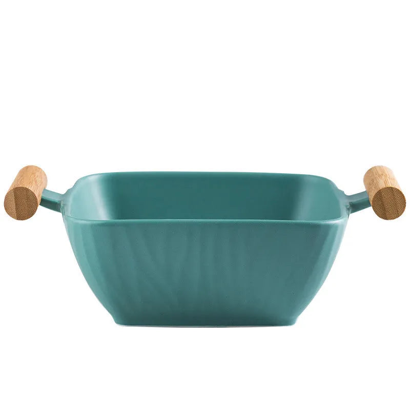 Irregular shaped porcelain serving bowl with lid in modern simple design