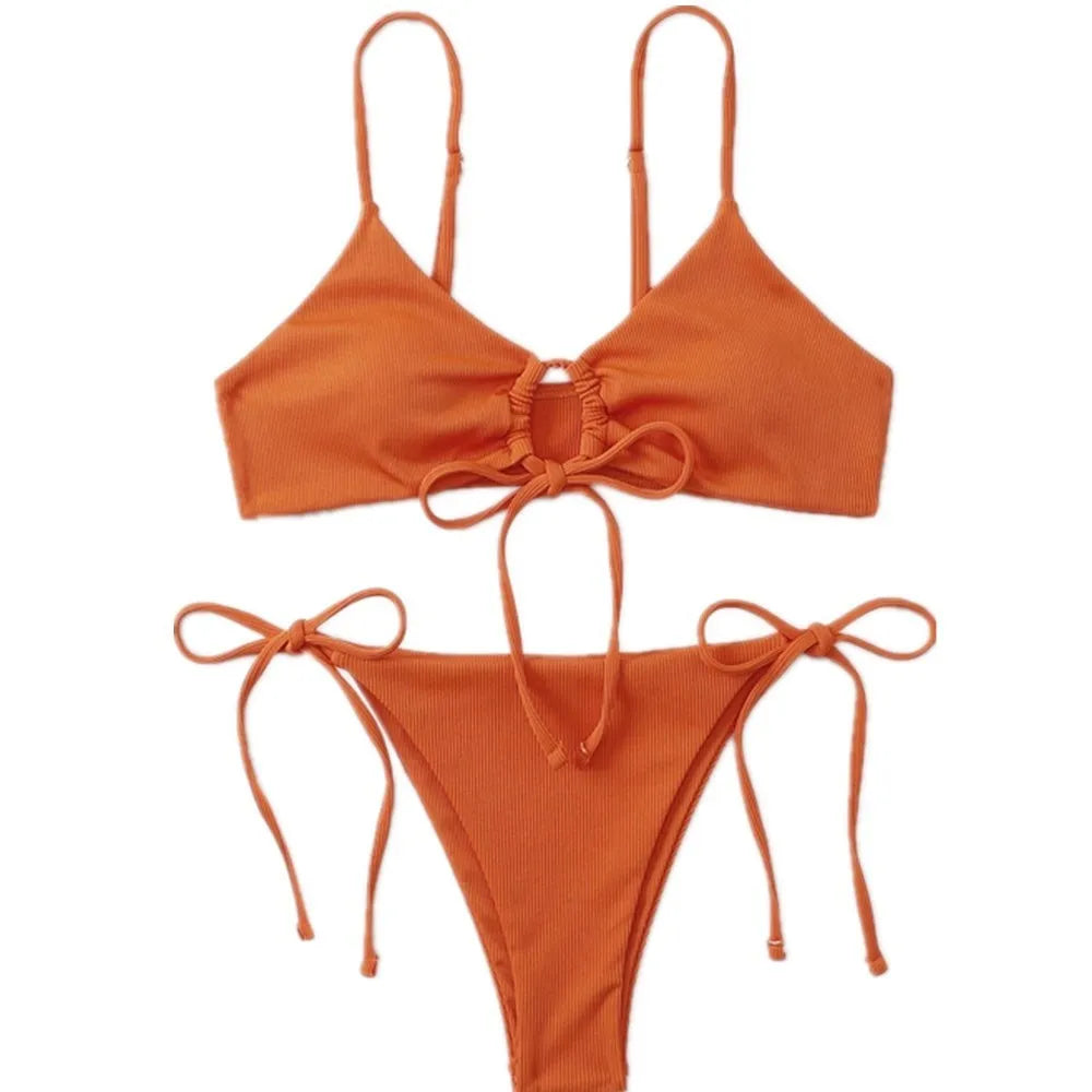 Women's solid color drawstring bikini set in backless brief style made of quick-drying nylon and spandex