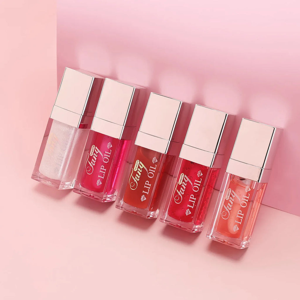 Mint flavour lip gloss stick in twist-up tube showing sheer glossy finish on lips