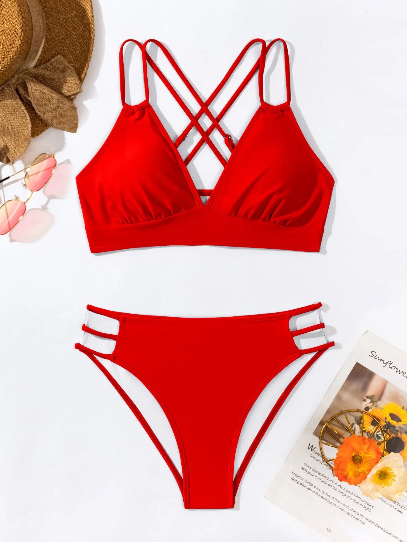 Women's black V-neck halter bikini with split leg shorts on a mannequin.