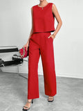Red sleeveless top and wide leg trousers two-piece set for women on a hanger.