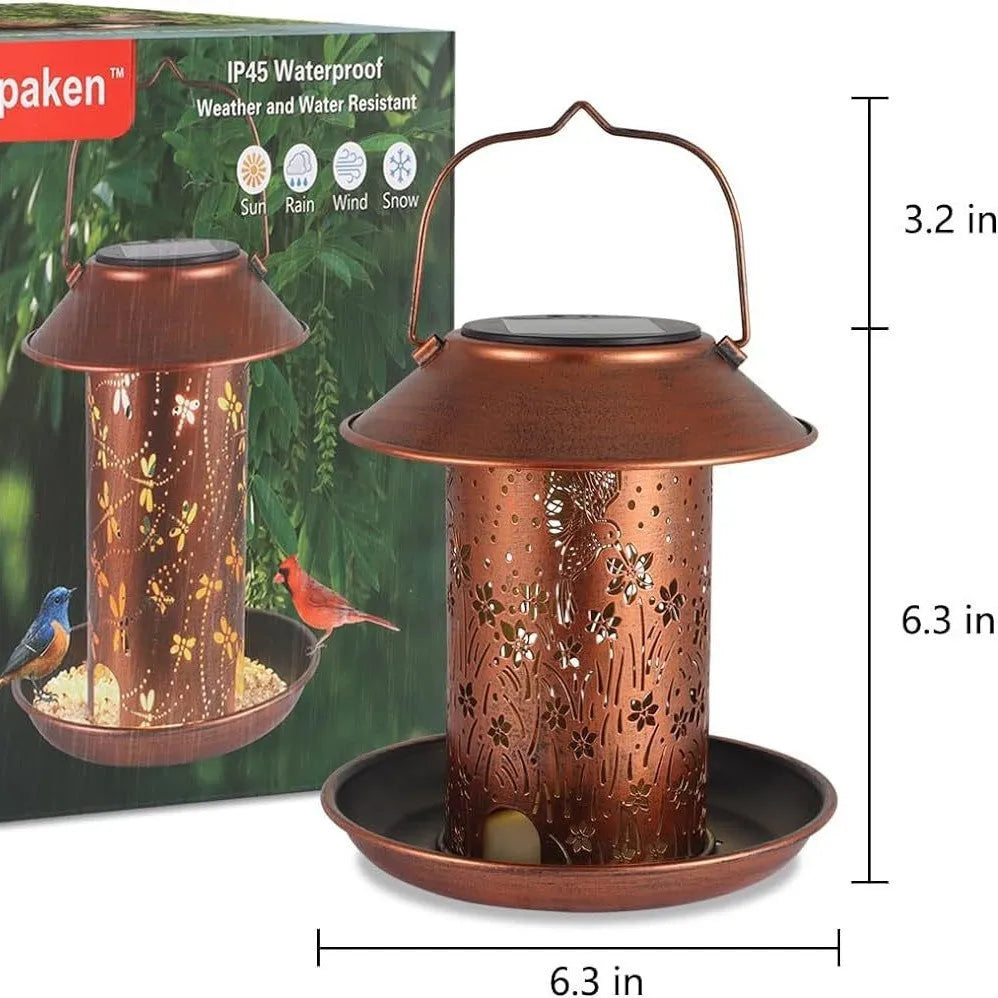 Solar-powered iron bird feeder with hummingbird pattern and integrated LED light for outdoor gardens