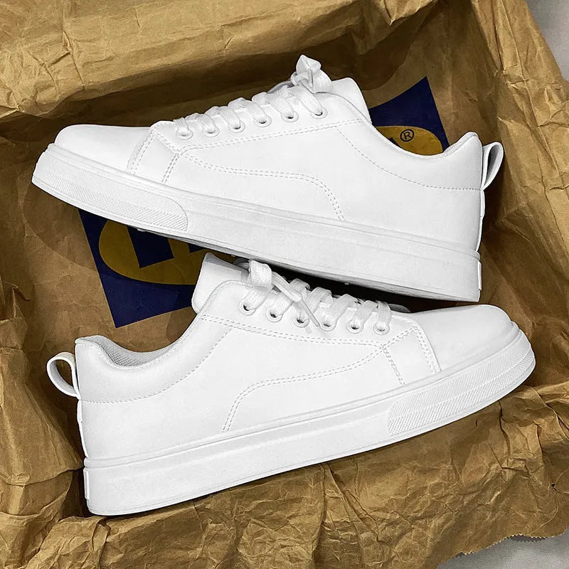 Men's low-top Korean-style sneakers in white and black colour options with round toe and flat rubber sole
