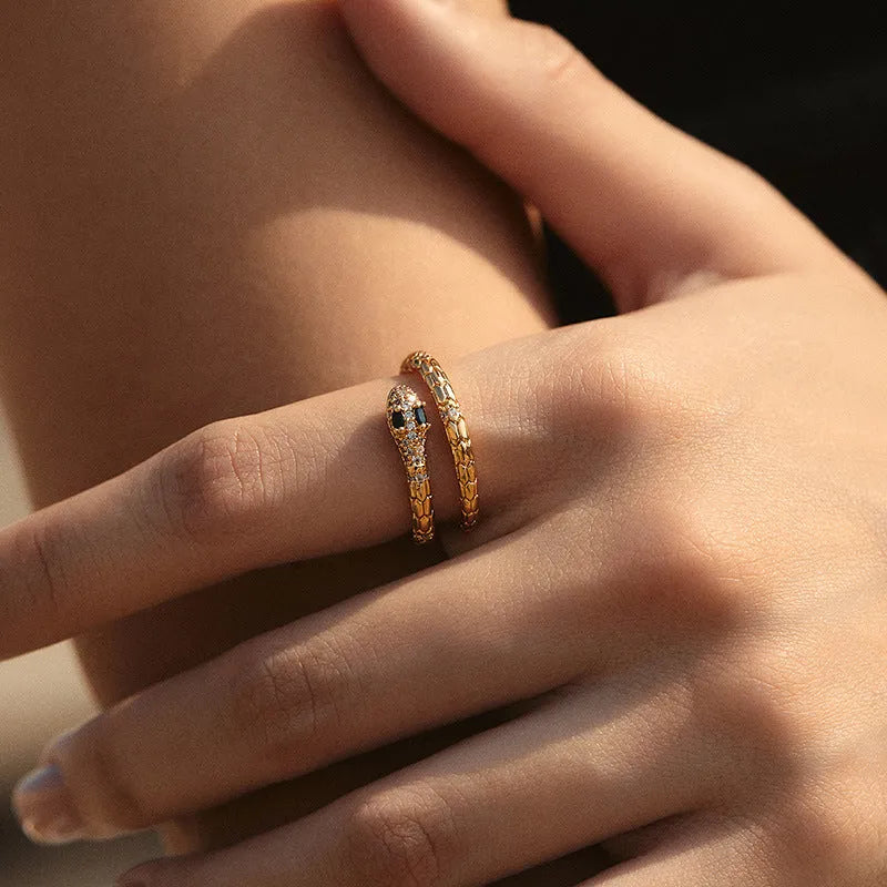Snake-shaped adjustable copper ring with 18K gold colour finish and detailed animal modelling