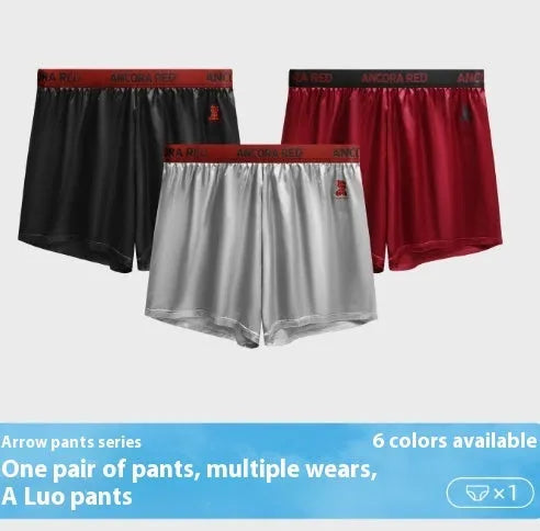 Men's solid colour knitted polyester boxer briefs on a mid-waist model, showing colour options black, blue, red, silver, purple, and brown.
