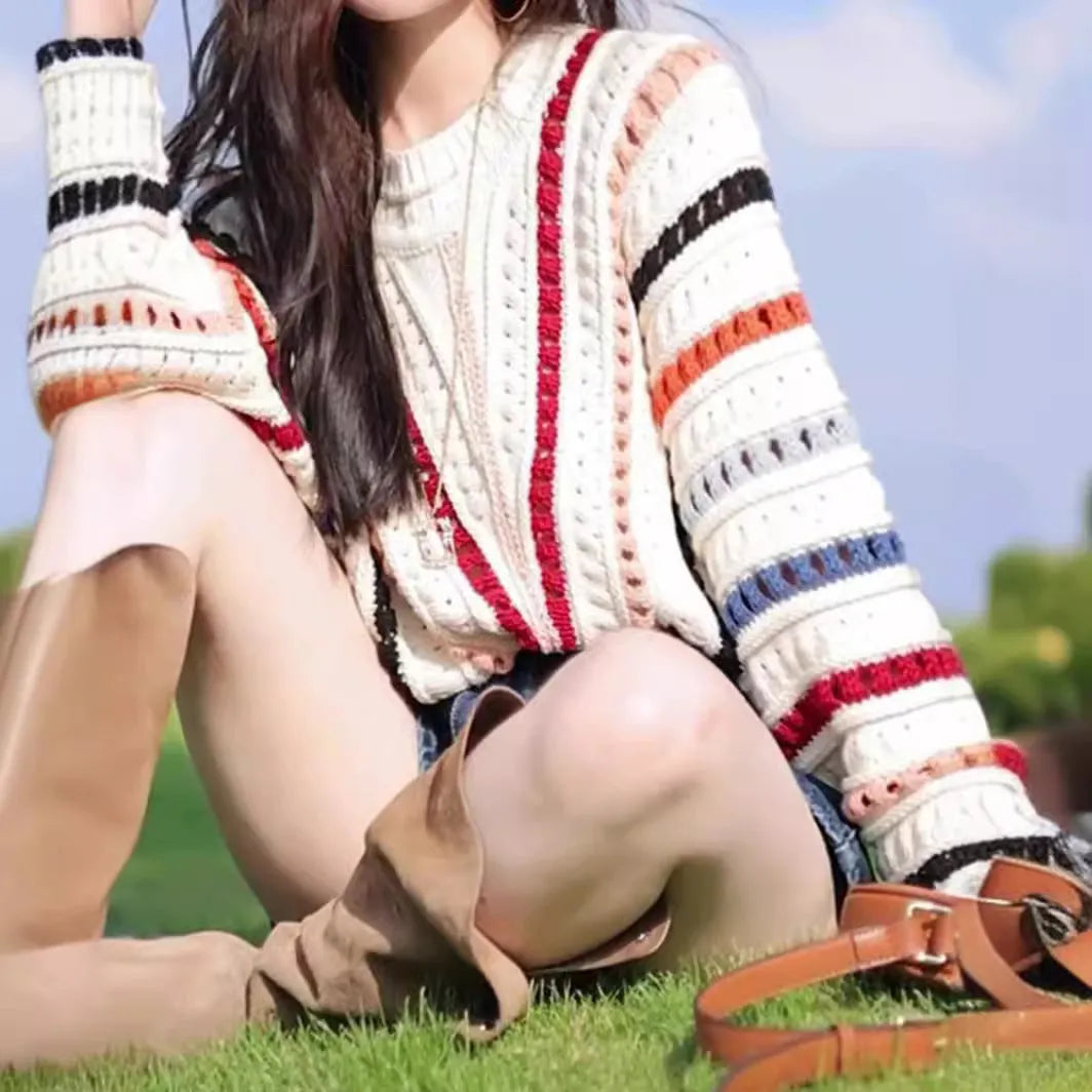 Colourful rainbow striped loose sweater with batwing sleeves and round neck