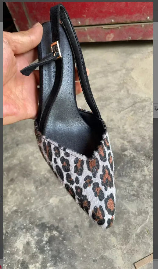 Women's leopard print suede sandals with scattered pointed toe design shown from side view
