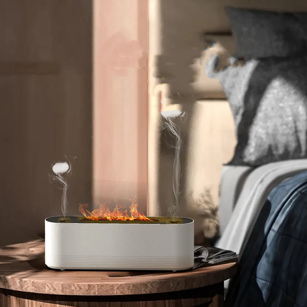 Black ultrasonic humidifier diffuser with colourful LED lights creating flame-like mist effect