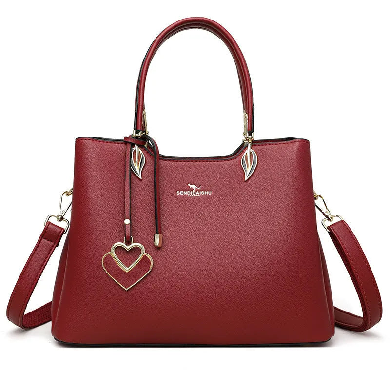 Women's PU leather messenger bag in multiple colours with cross-body strap and stitching detail