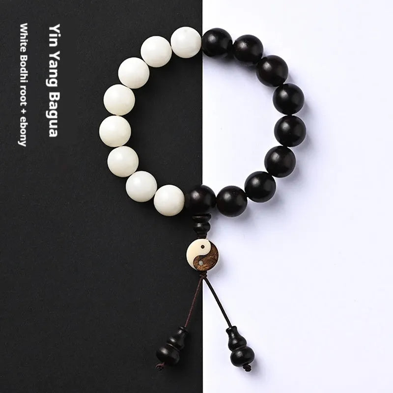 White and blackwood bead bracelet in eight-diagram pattern with natural bodhi seeds