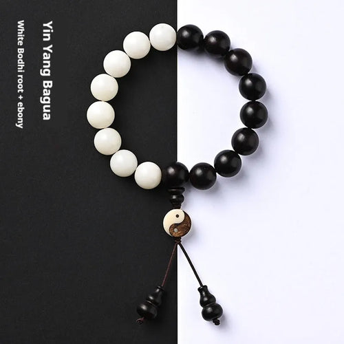 White and blackwood bead bracelet in eight-diagram pattern with natural bodhi seeds