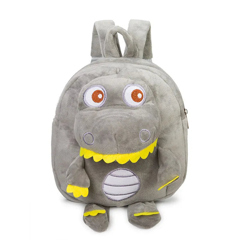 Dinosaur plush toy backpack for children with embroidery detailing and soft handle in blue colour