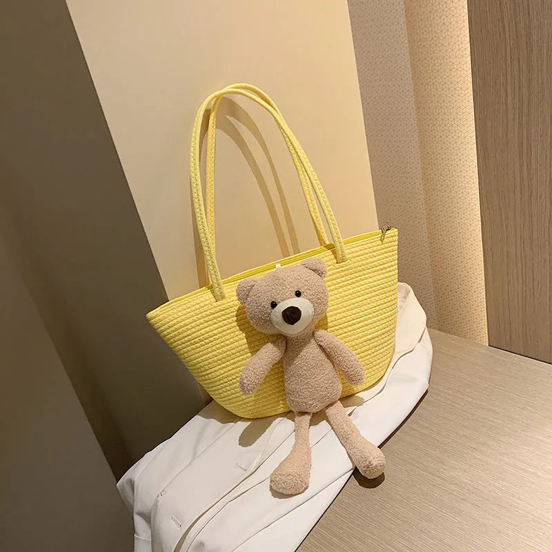 Cotton and linen woven bag with dumpling shape, double shoulder straps, and three-dimensional pocket