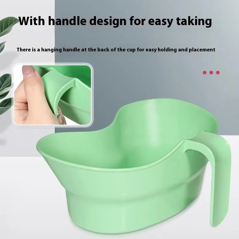 Green plastic gargle cup for elderly bedridden patient nursing care