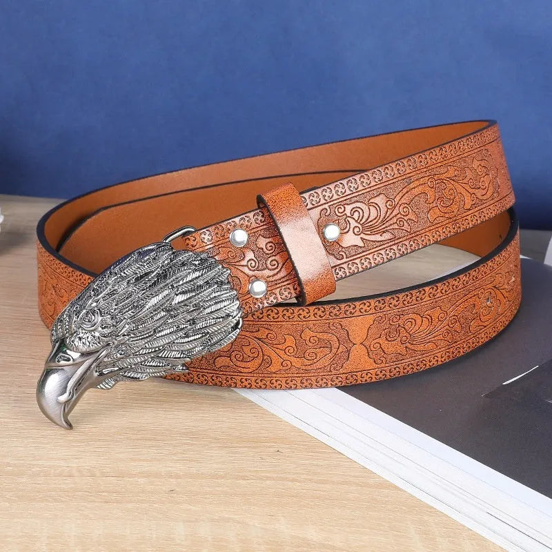 Men's black imitation leather belt with a detailed metal cow head buckle and pin clasp.