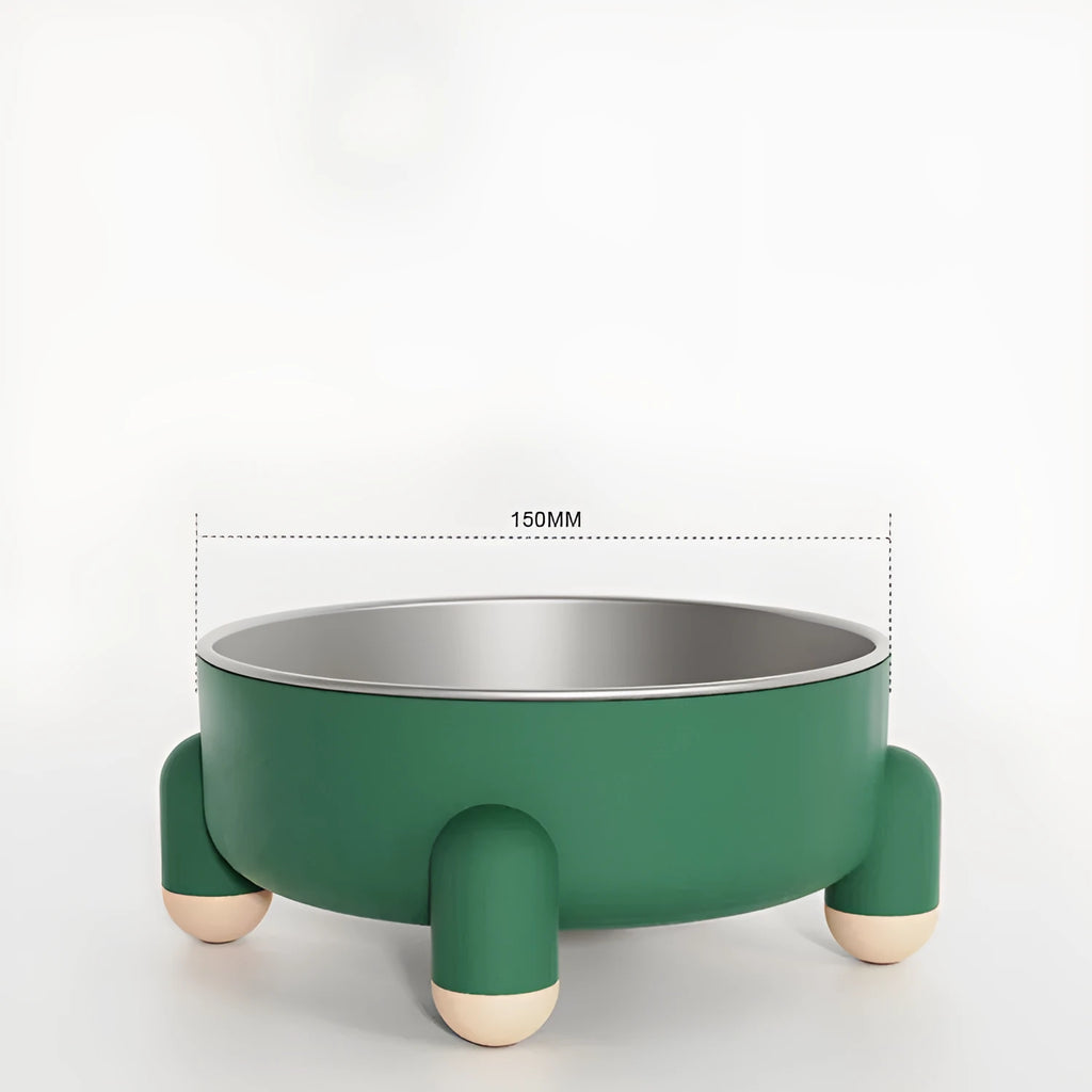 Green stainless steel pet bowl with non-slip base and high foot on a kitchen floor