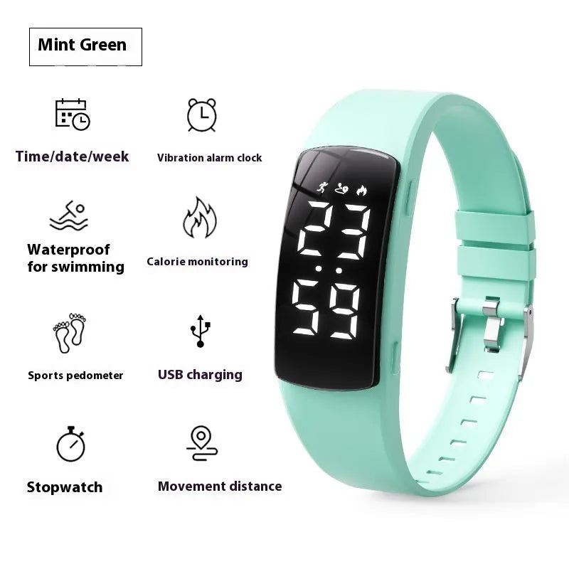 Black vibration alarm smart watch with LED display and silicone strap on a wrist.