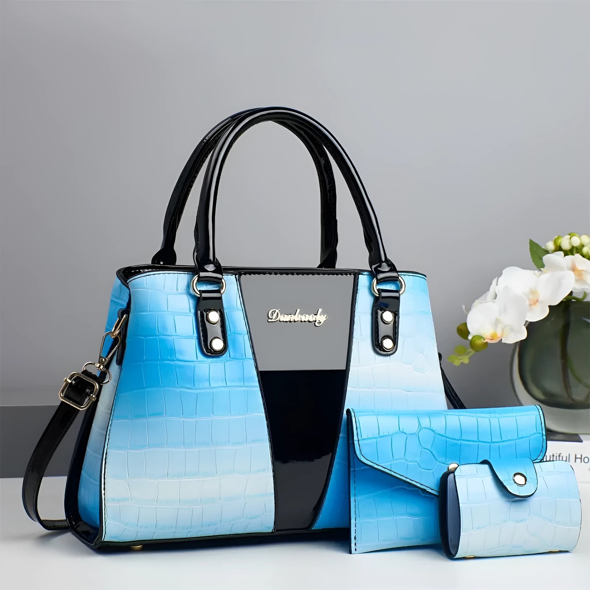 Women's crocodile stitching three-piece shoulder bag set in PU, showing main bag, smaller bag, and card bag.