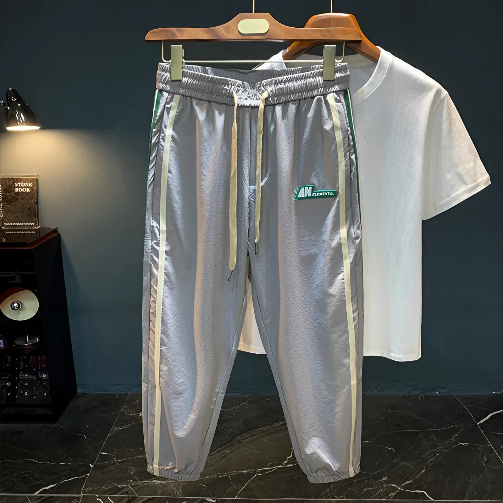 Men's black cotton harem pants with a loose fit and mid waist