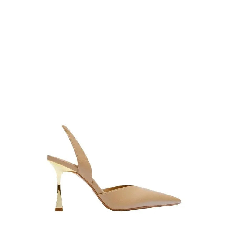 Women's pointed patent leather high heels in nude apricot colour with shallow cut design