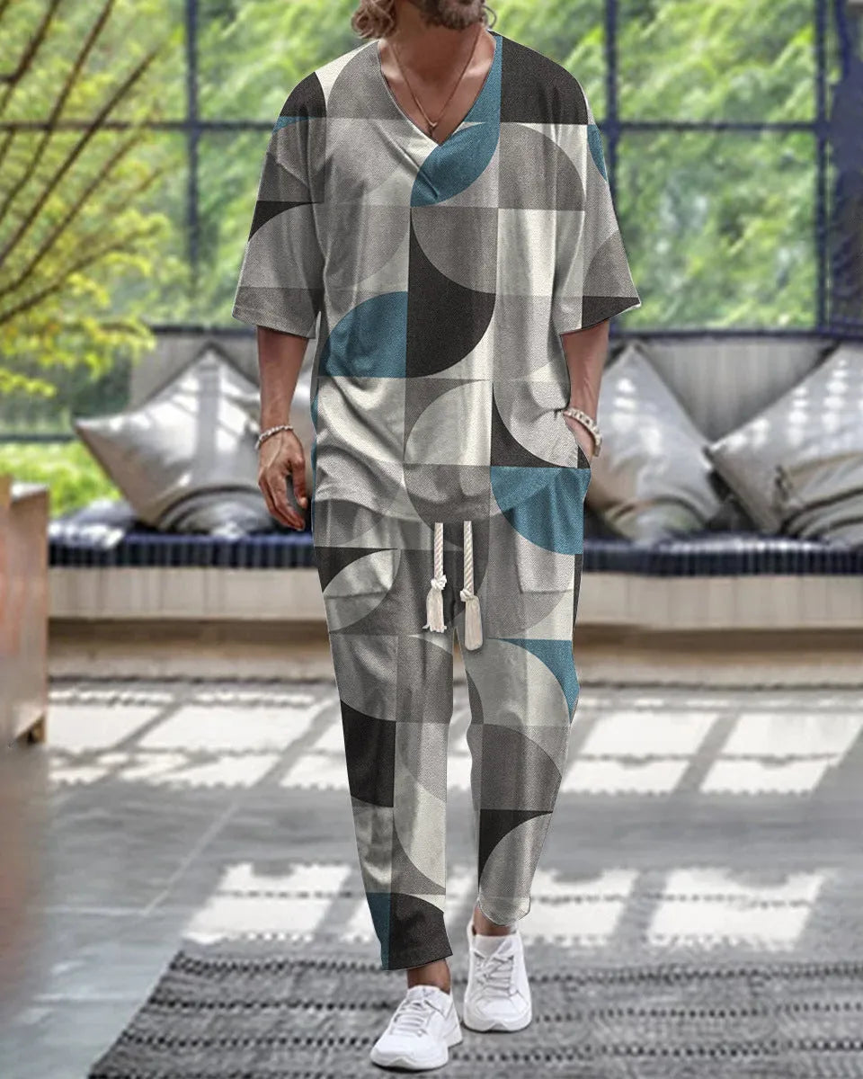 Cropped sleeve V-neck trousers suit set in thin polyester fabric on a hanger.
