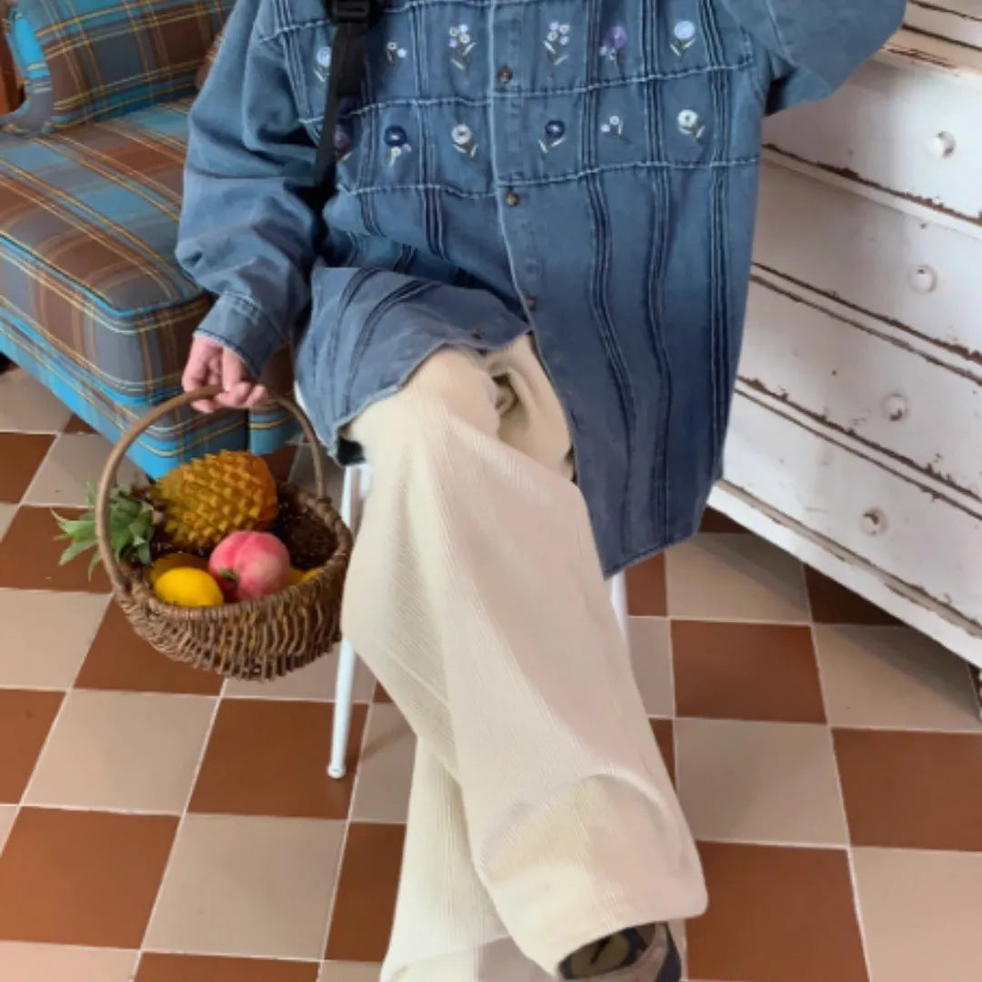 Vintage washed blue denim shirt with floral pleated detailing and long sleeves