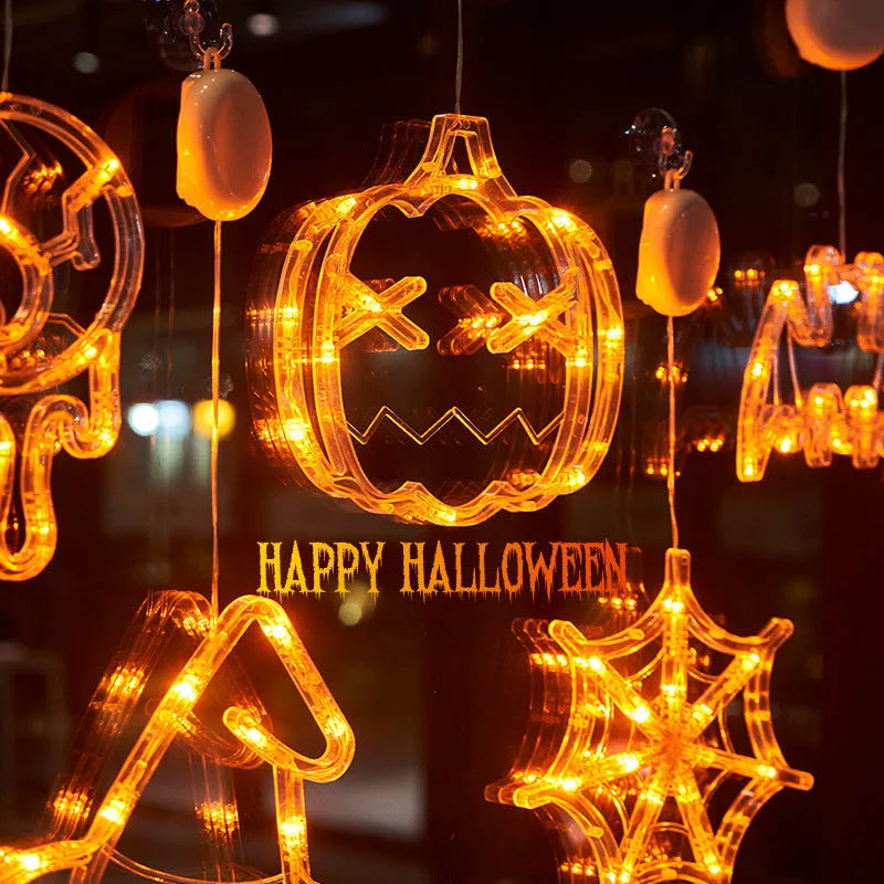 Halloween window hanging LED lights with seven designs including spider, pumpkin, ghost, and bat motifs