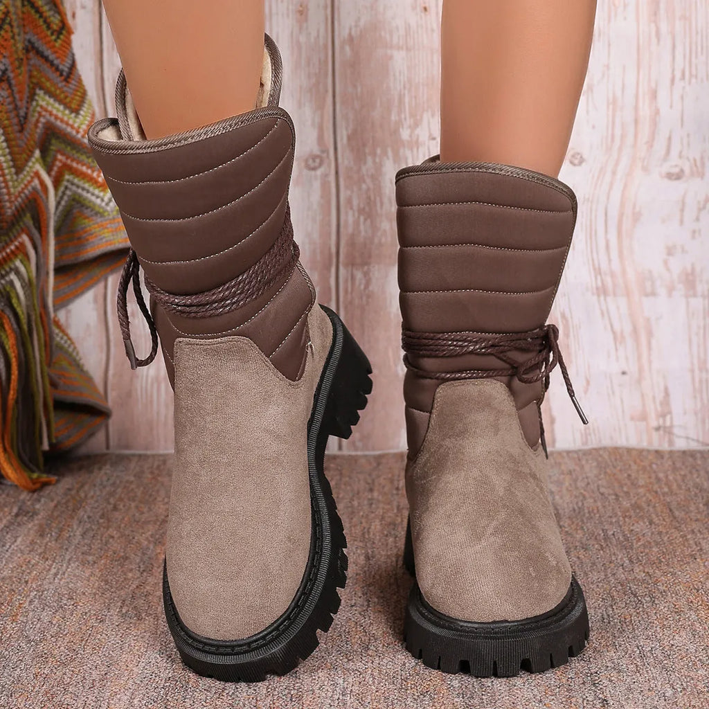 Women's black suede snow boots with chunky heel, lace-up front and fleece lining