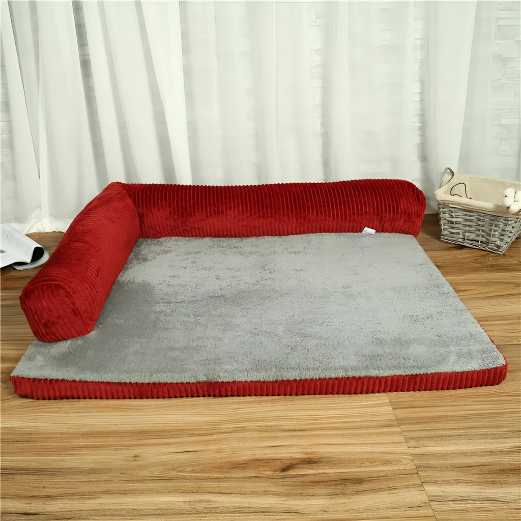 Corduroy pet sofa dog bed in grey, showing bilateral raised edges and non-slip base.