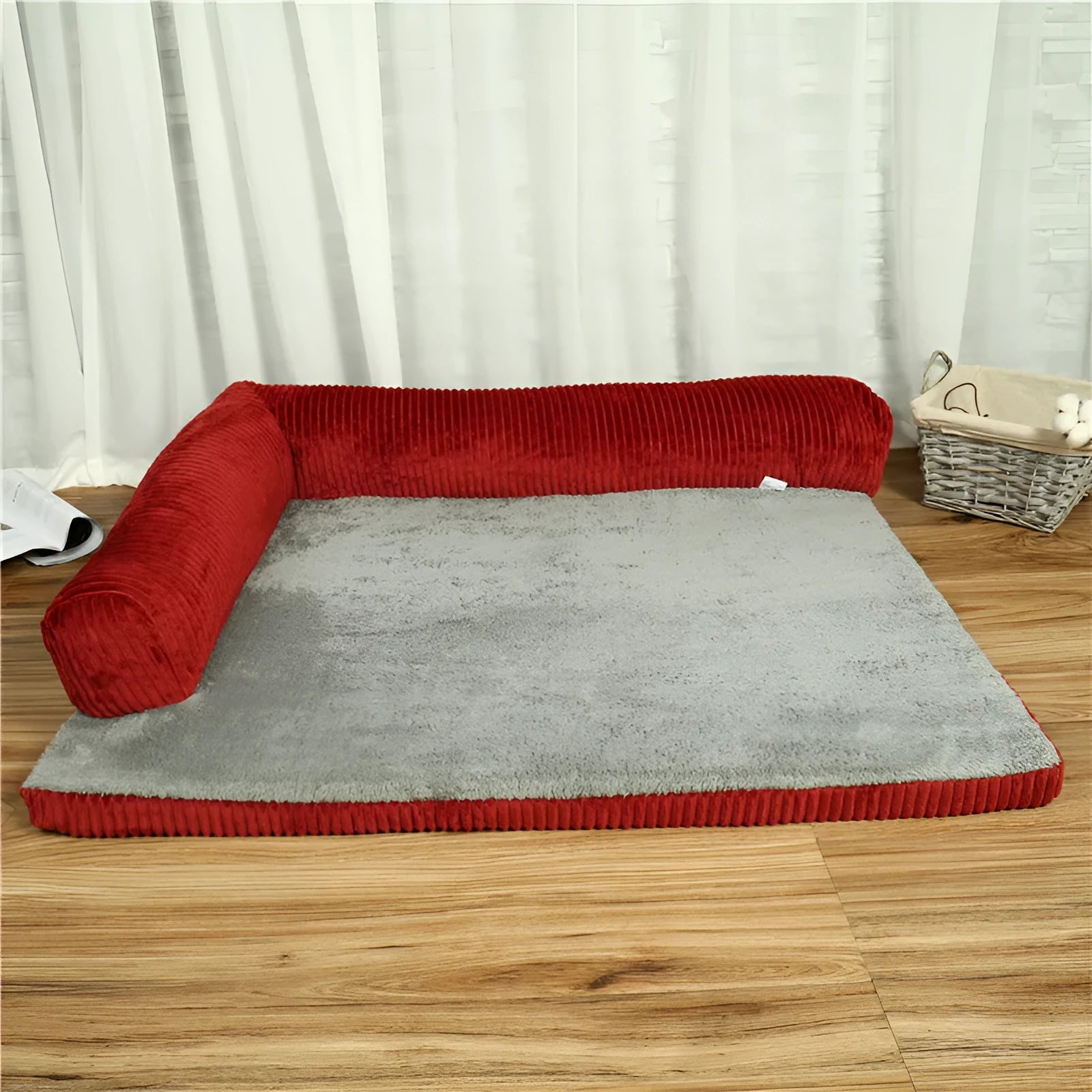 Corduroy pet sofa dog bed in grey colour with a non-slip base, shown in a bilateral style.