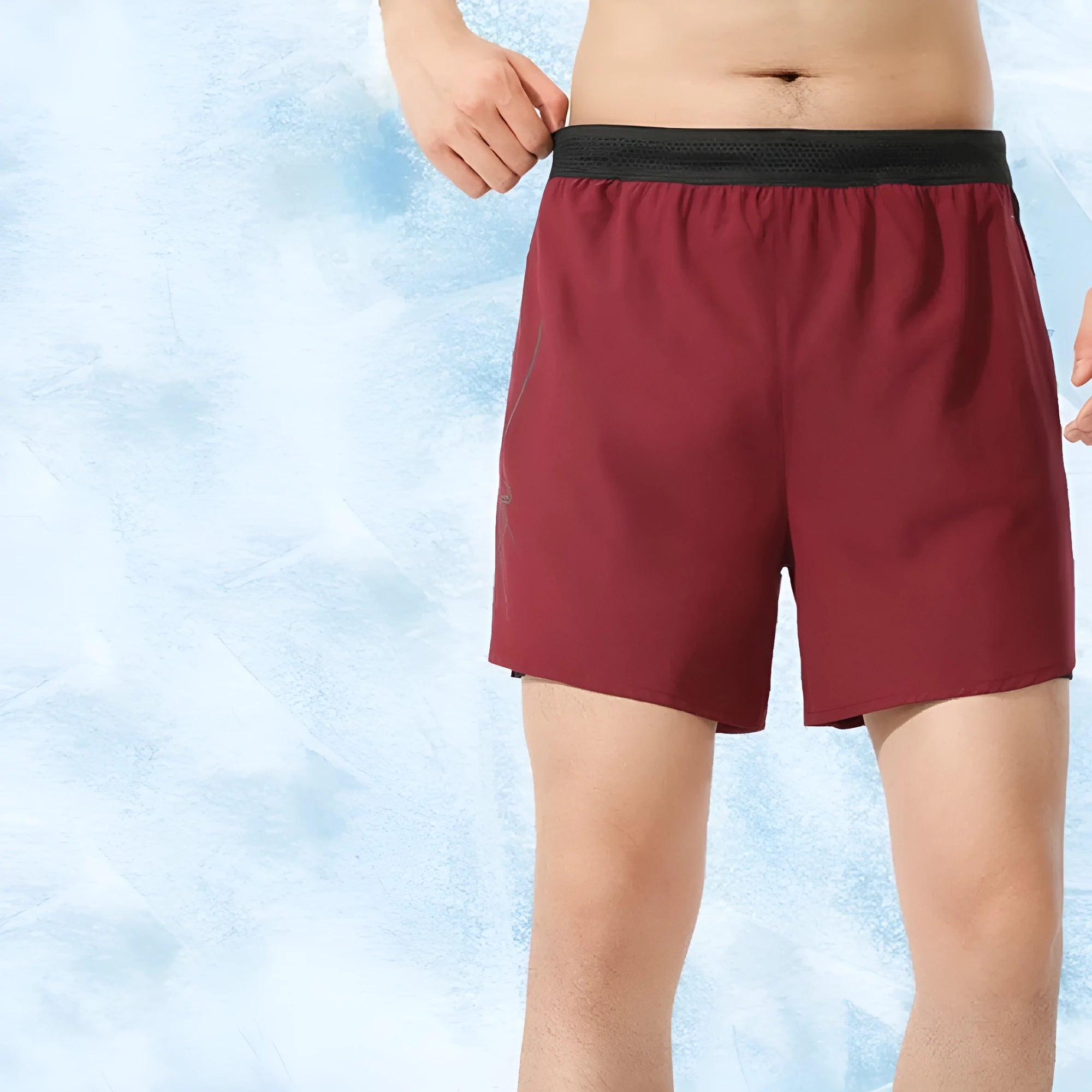 Men's low-waist polyester basketball shorts in a solid colour on a size chart background.