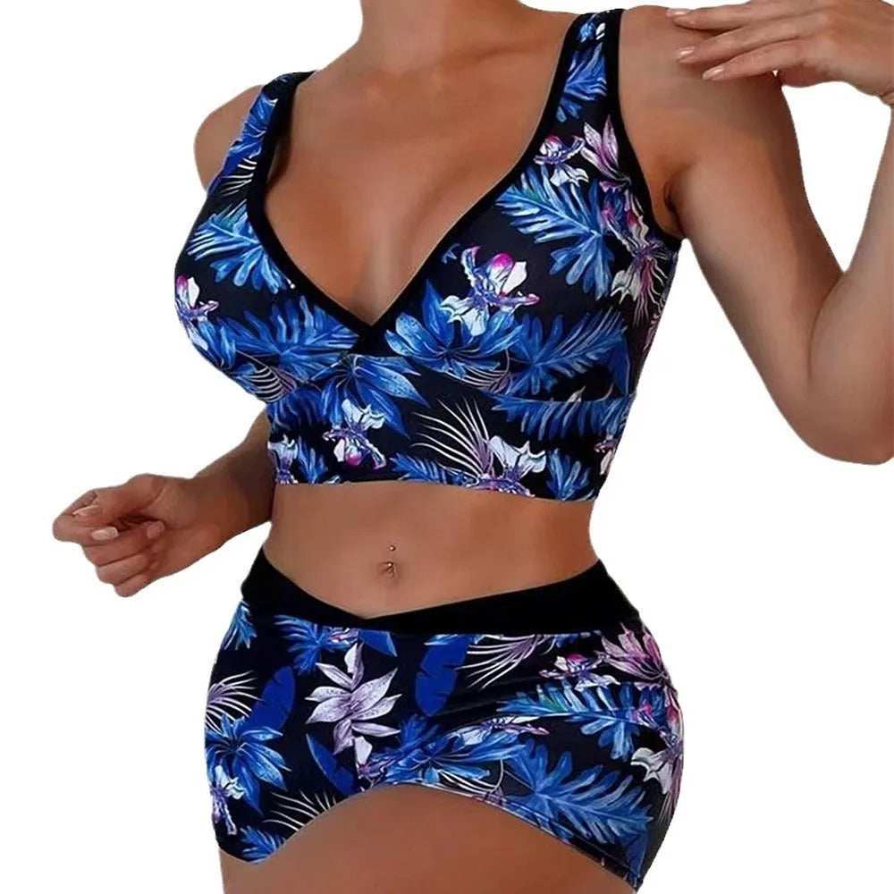 Women's two-piece swimsuit with sleeveless top and printed boxer shorts in multiple colours.