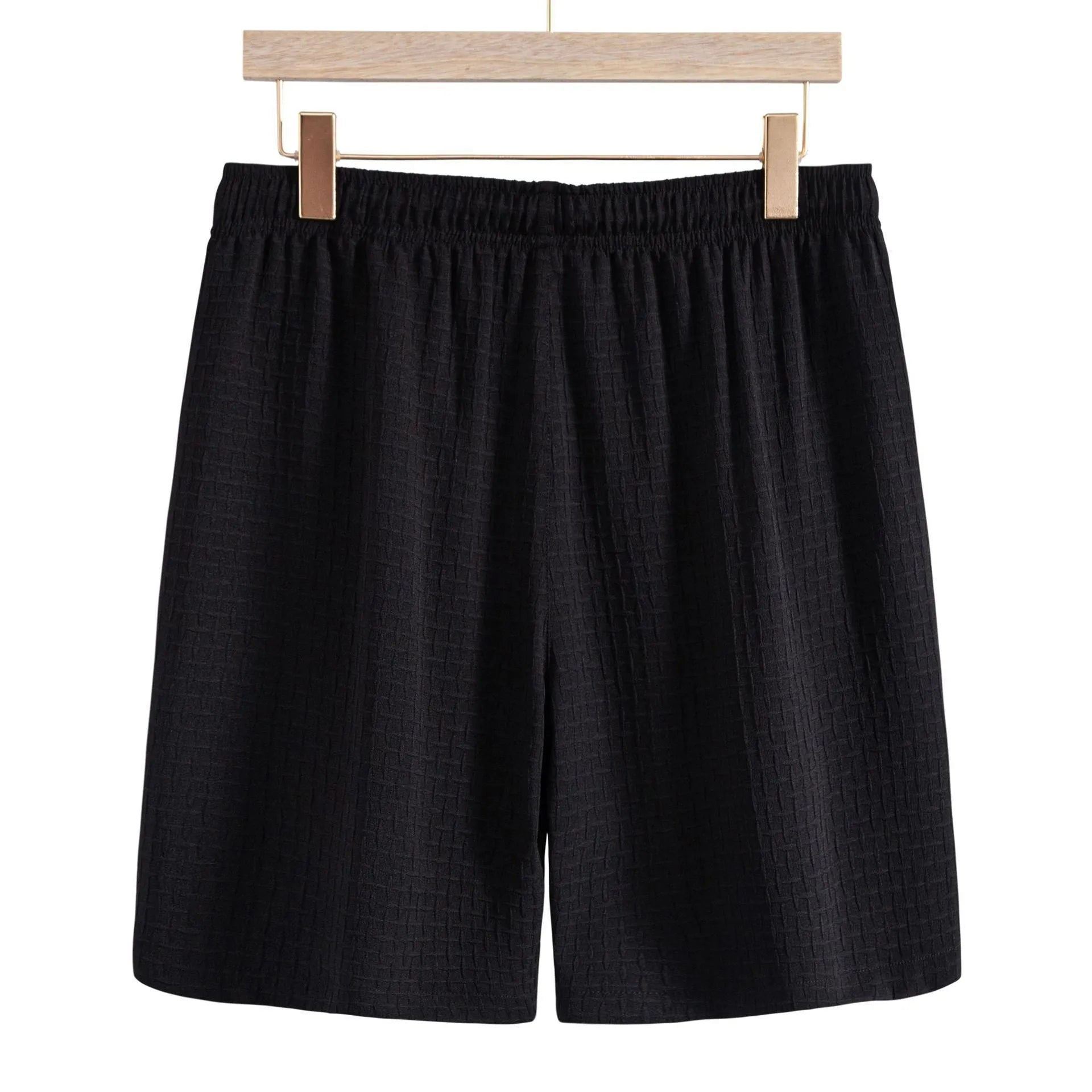 Men's black cotton blend short sleeve shirt and shorts casual suit set on a hanger.