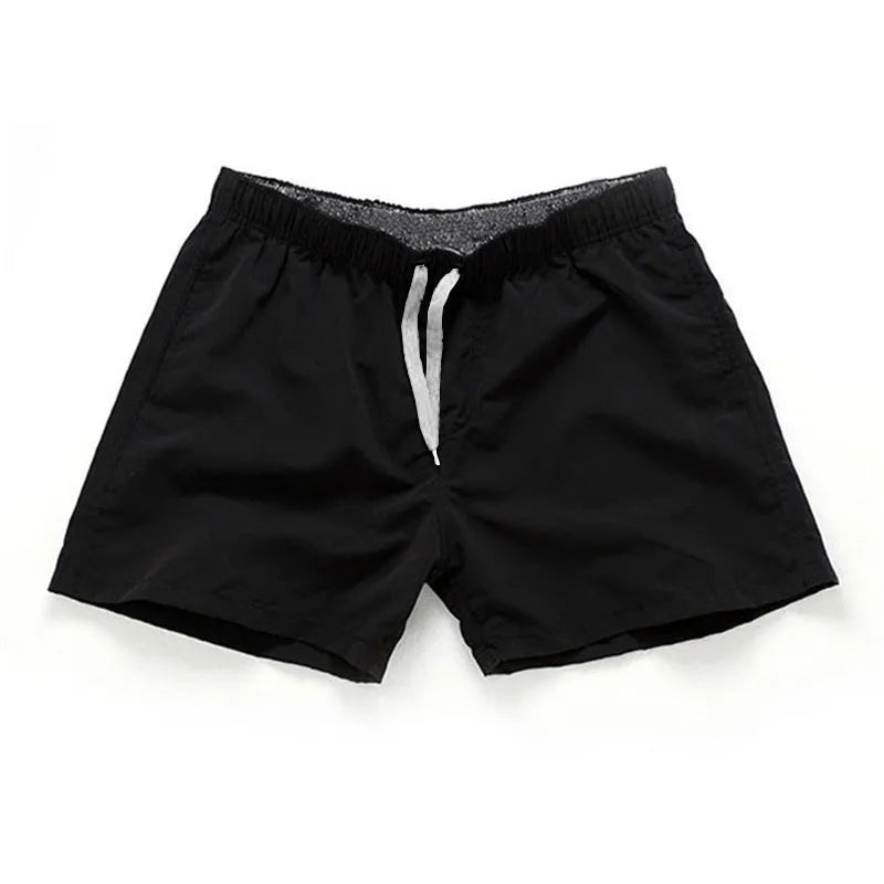 Men's straight leg beach shorts in polyester fabric available in multiple colours and sizes S to 4XL