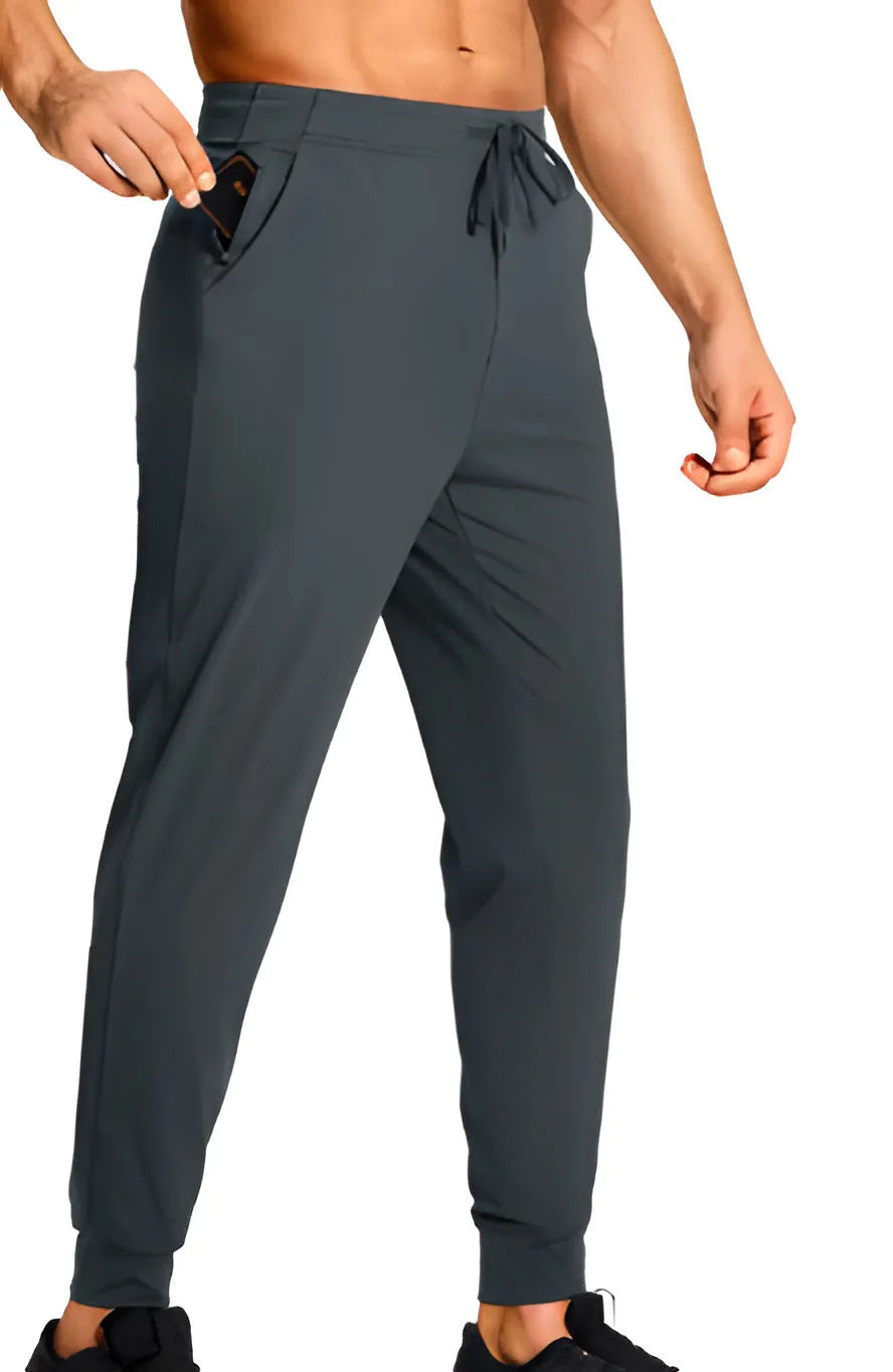Men's loose-fit solid colour casual trousers on a hanger, showing the relaxed leg cut.
