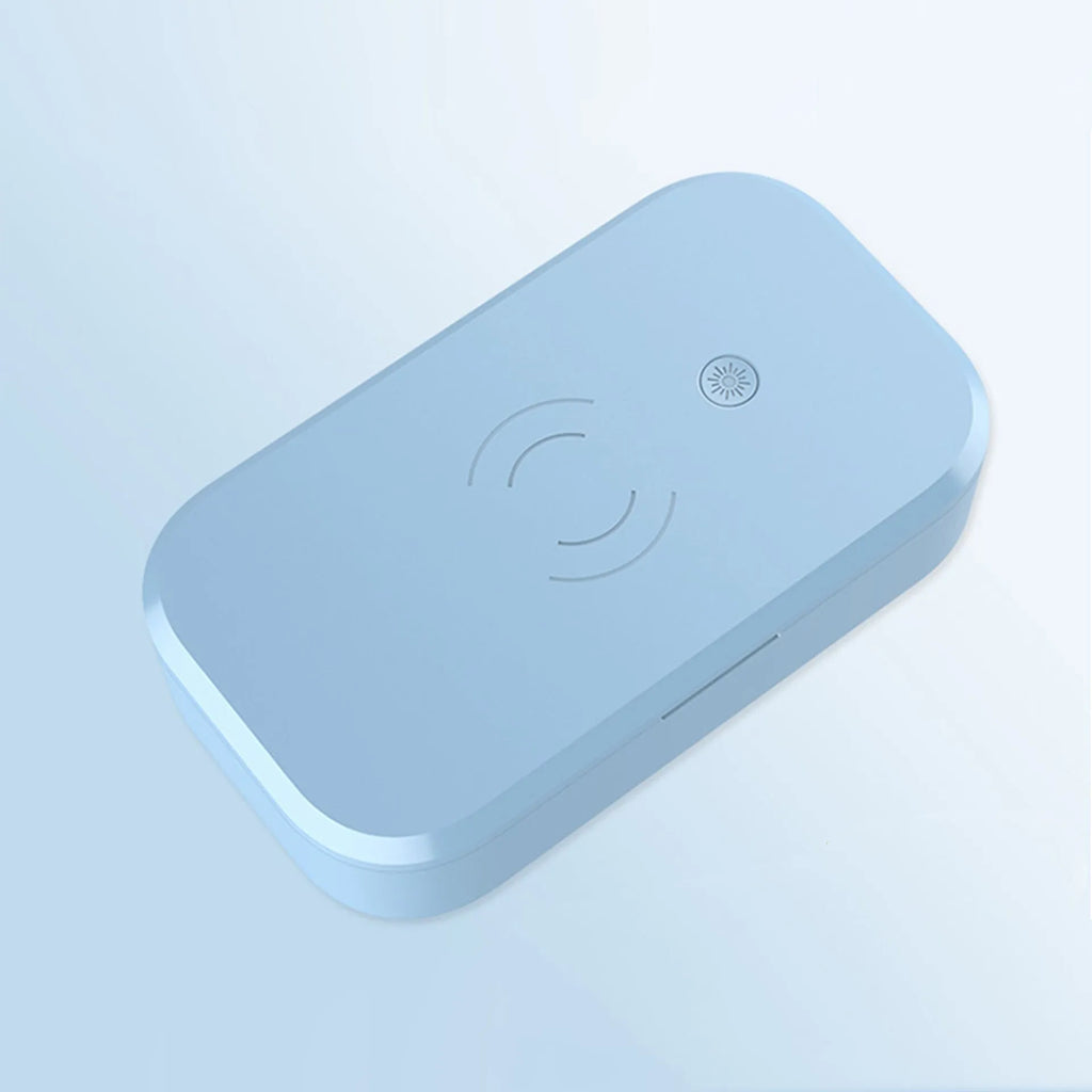 White ultraviolet disinfection box with wireless charging for mobile phones and beauty tools.